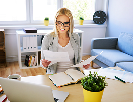 Business woman comparing documents