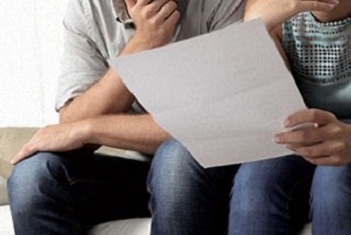 Couple looking at bank statements