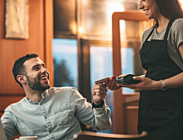 Man tapping card or merchant terminal